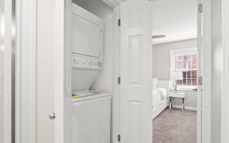 a closet with a washer and dryer